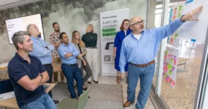 TogetherWork product managers at a one-day Productside AI workshop building PRDs and user stories during the Austin Product Summit